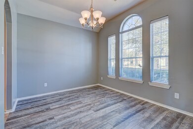 Dining room adorned with beautiful wood look tile