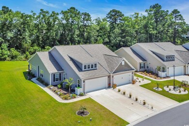 View of front of house featuring driveway, a front yard, and roof with shingles