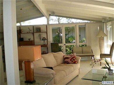 Living Room with Beamed Ceilings