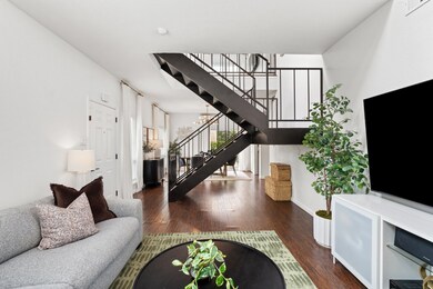 This modern living space features an open floor pl