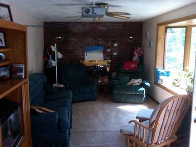 Living Room. The fireplace was originally log burn