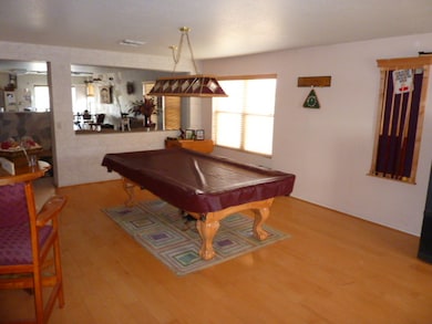 FORMAL LIVING ROOM, CURRENTLY BILLIARDS