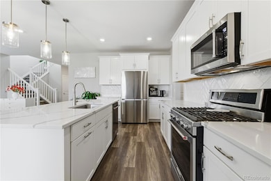 Large kitchen island perfect for gatherings with gas range