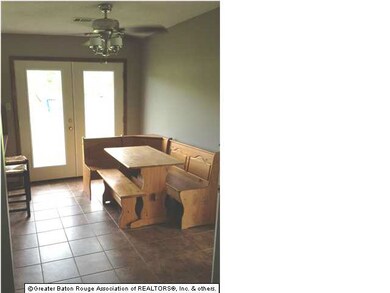 dining area with french door leading to back yard