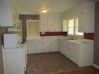 Plenty of cabinet space in the open kitchen.
