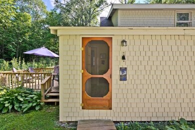 Sweet entry way to enclosed porch
