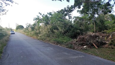 SW 227 ST View West toward SW 118 Ave 