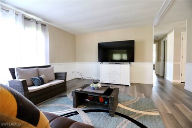 Living room featuring wood-type flooring