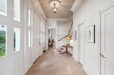 Graceful entry leads to living room or den or up t