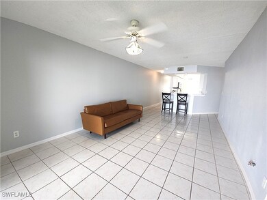 Unfurnished room with visible vents, baseboards, l