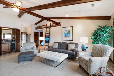 Living Room with wet bar & loft