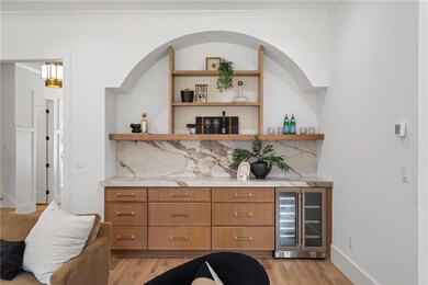 Bar has beverage cooler and lots of storage.