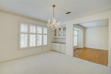 This dining room view highlights a convenient buil