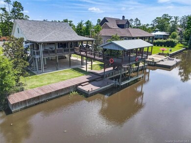 Second view of Exterior of home with view of wharf