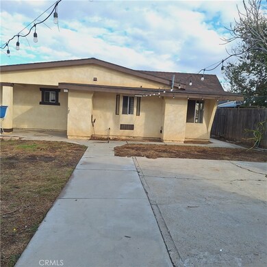 Concrete area in between house and storage area