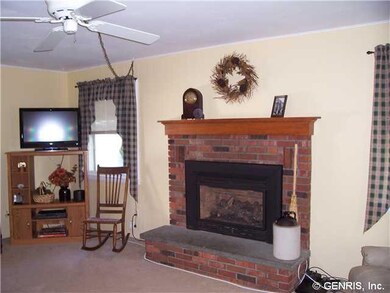 Family Room Family room with wood burning fireplac