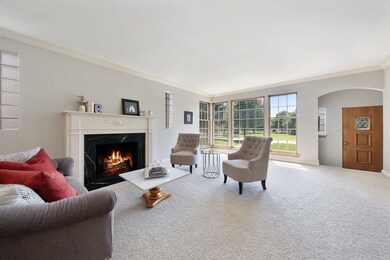 Lovely Living Room with Marble Surround Fireplace