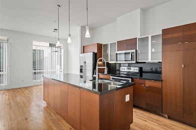 Sleek kitchen with modern fixtures and ample natur