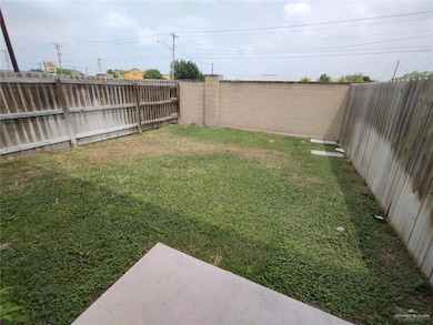 View of fenced backyard