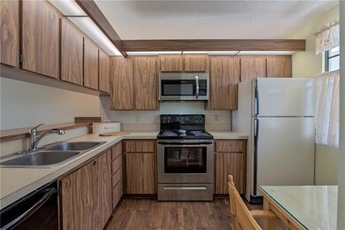 Kitchen has tons of cabinets and new stainless ste