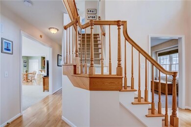 Step into a warm entry foyer featuring a tradition