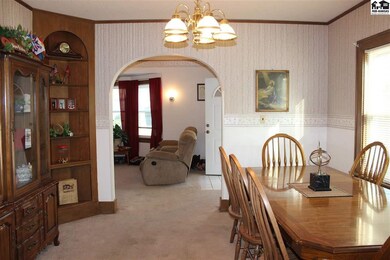 Looking from the kitchen doorway through dining ro
