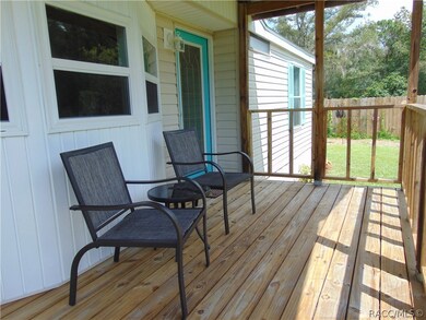 REST YOU FEET ON THIS FRONT PORCH