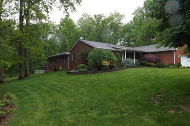 View of Home from East Side. Nice large yard.