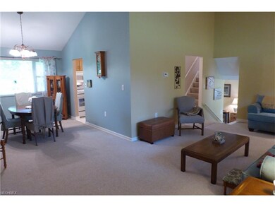 View of L-Shaped Vaulted Living and Dining Rooms!