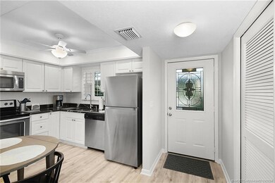 Front Door Entry Area with Kitchen on Left