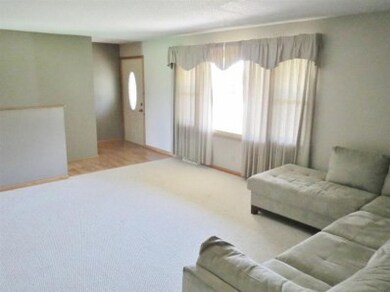 Living Room with half wall.