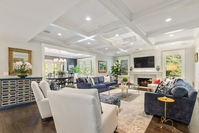 Open to kitchen and dining room, with handsome mil