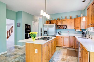Kitchen offers new quartz counter tops, SS fridge 