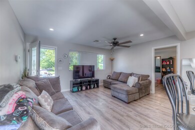 Living area featuring light wood-type flooring, re