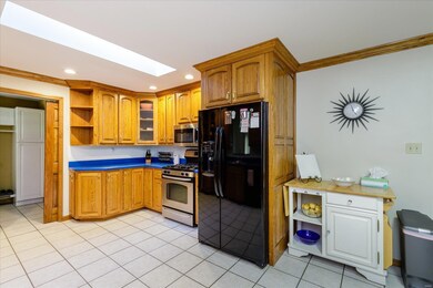 Kitchen with Skylight and Recessed Lighting