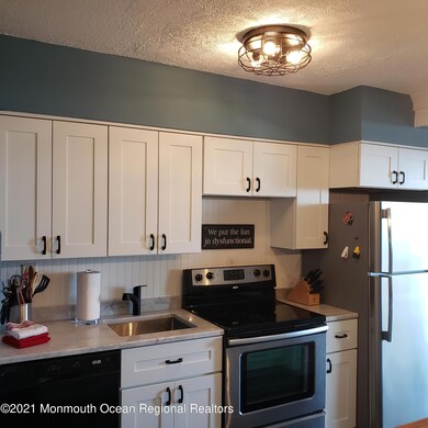 Channel Club Tower unit 907, Monmouth Beach, NJ 07750 - photo 4