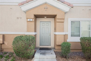 Doorway to property with visible vents and stucco