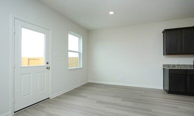 This large dining area is the perfect size for hosting family and friends.