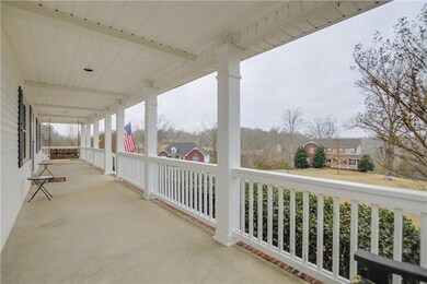 Covered Front Porch With Great View 
