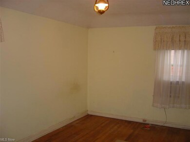One of three second floor bedrooms.