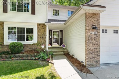 Charming covered entry with fresh landscaping and a warm welcome that practically waves you inside.