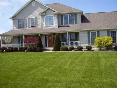 Exterior Front. Professionally landscaped maintain