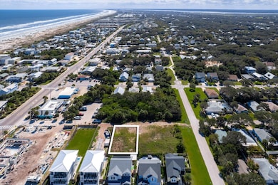 View of property location with nearby suburban area and unending shoreline