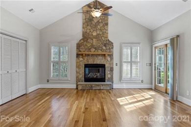 Dramatic stack stone fireplace from floor to ceili