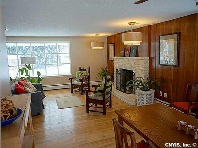 Living Room. The open floor plan wraps around to t