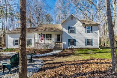 Covered front porch, vinyl siding, gutters