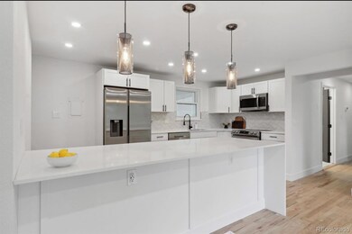 348 S Racine St, Aurora, CO 80012 - photo 2