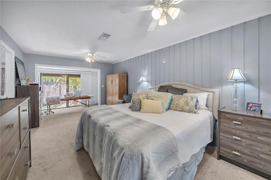 Primary Bedroom with extra space overlooking the backyard.