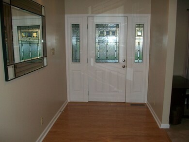 Stunning new entry door to the large foyer with gl