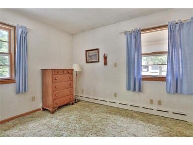 2nd Bedroom on Main level.  Hot water baseboard bo